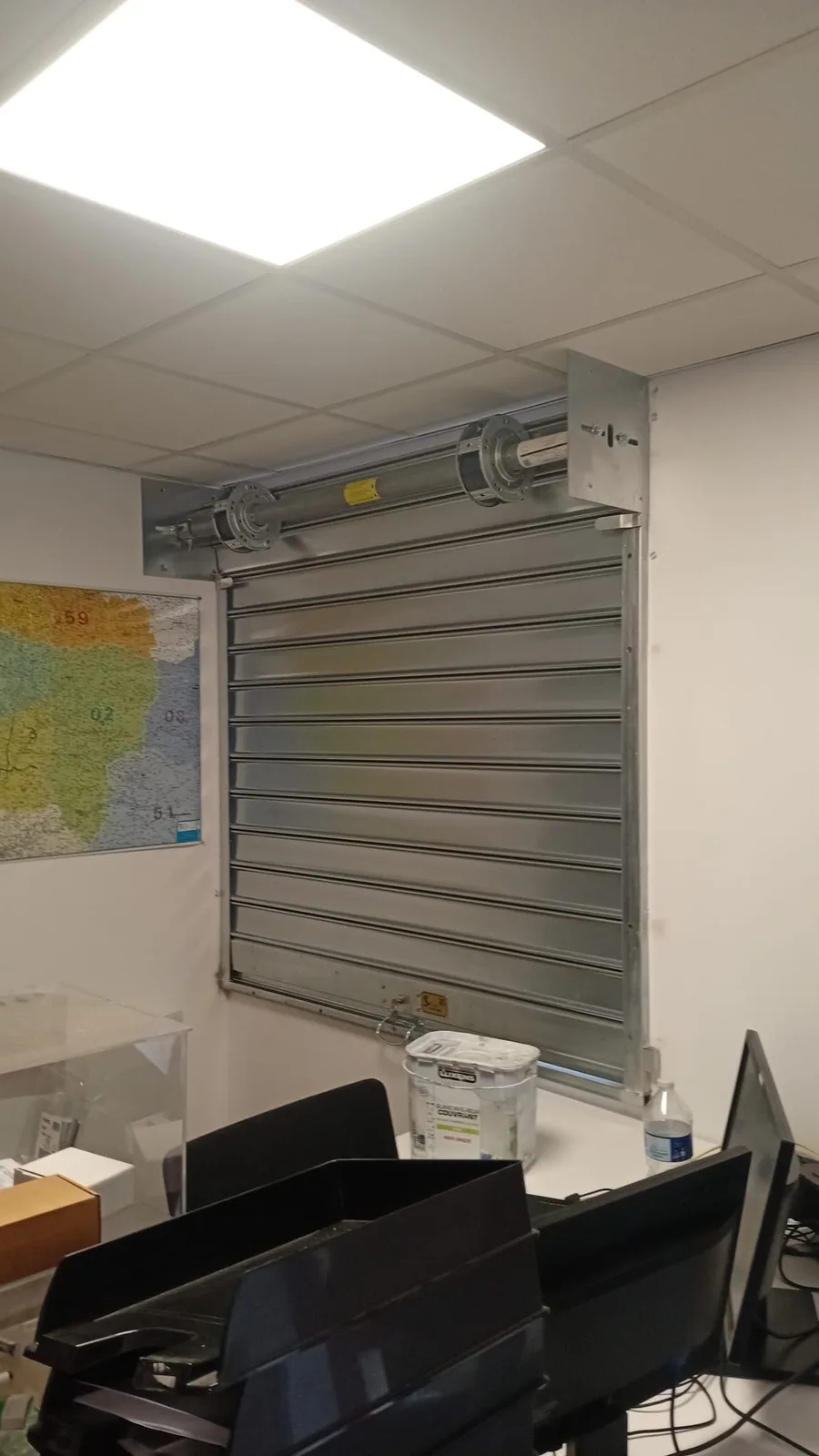 Installation et pose de rideau métallique à Paris 9
